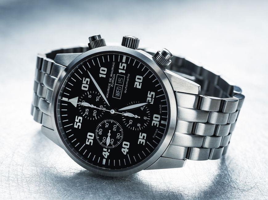 Runde Silberfarbene Chronographenuhr Mit Gliederarmband
