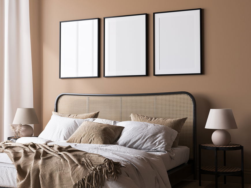 Schlafzimmer Bett Rattan schwarzer Rahmen Bettwäsche