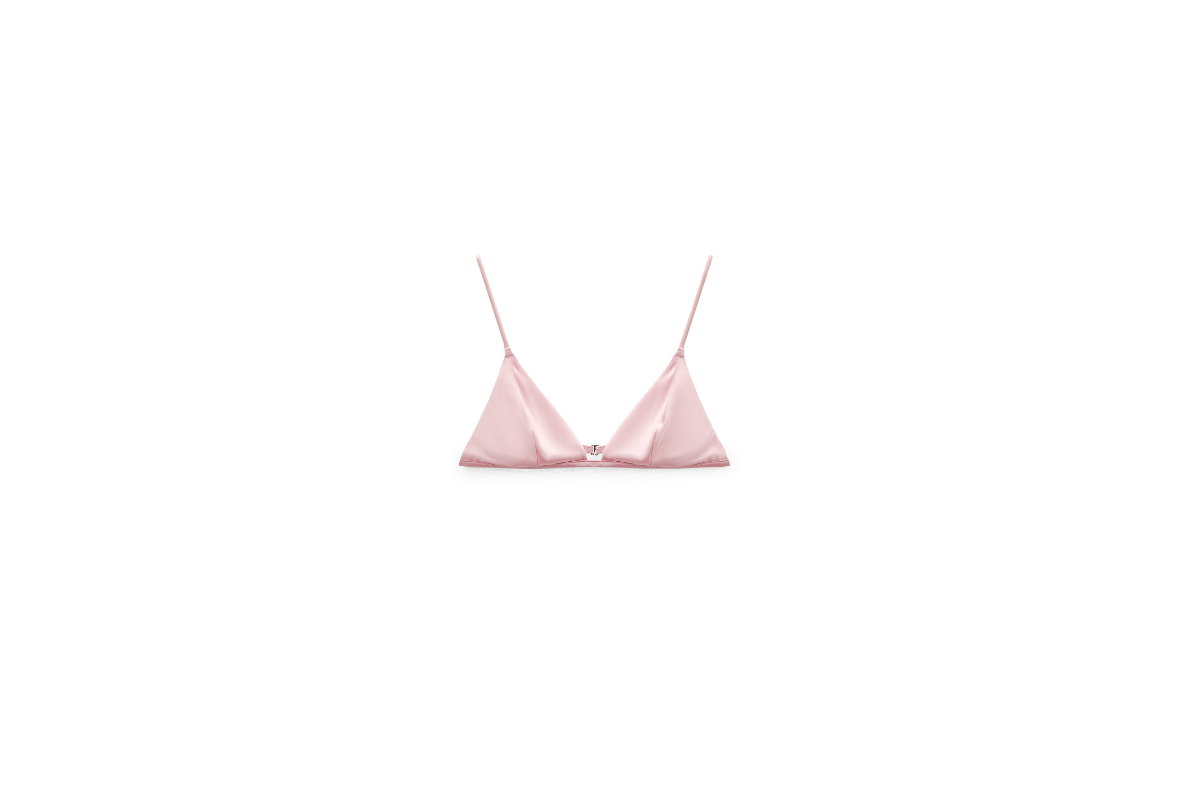Frau trgtä pinke Kleidung