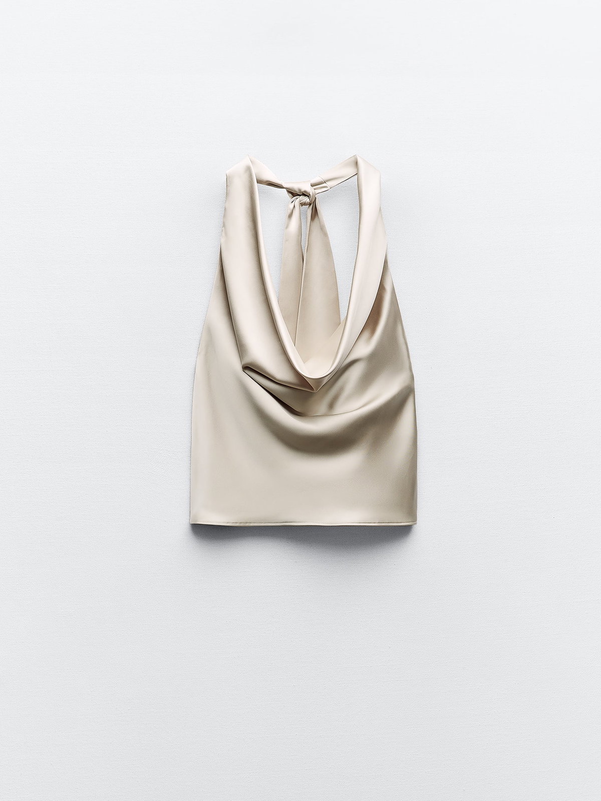 Neckholder-Oberteil mit Schleifendetail. Ärmellos. Rückenfrei. Verdeckter Nahtreißverschluss gold Zara