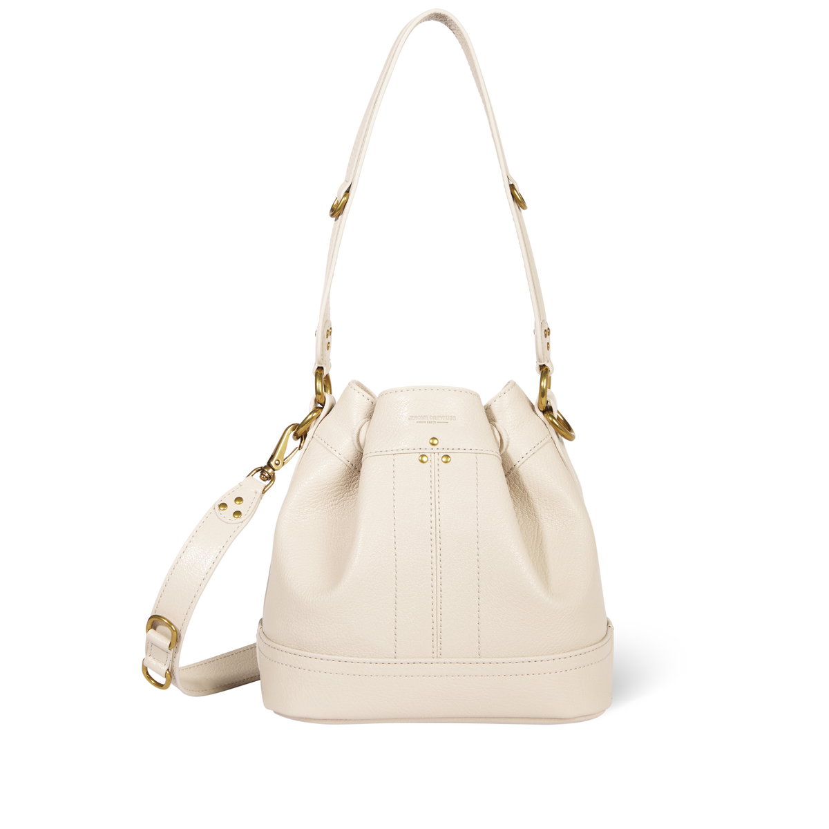 Für den Sommer legen wir uns die stilvolle Bucket Bag in elegantem Ecru von Jerome Dreyfuss zu. Die Tasche ist aus hochwertigem Leder gefertigt und mit einer goldenen Hardware veredelt.