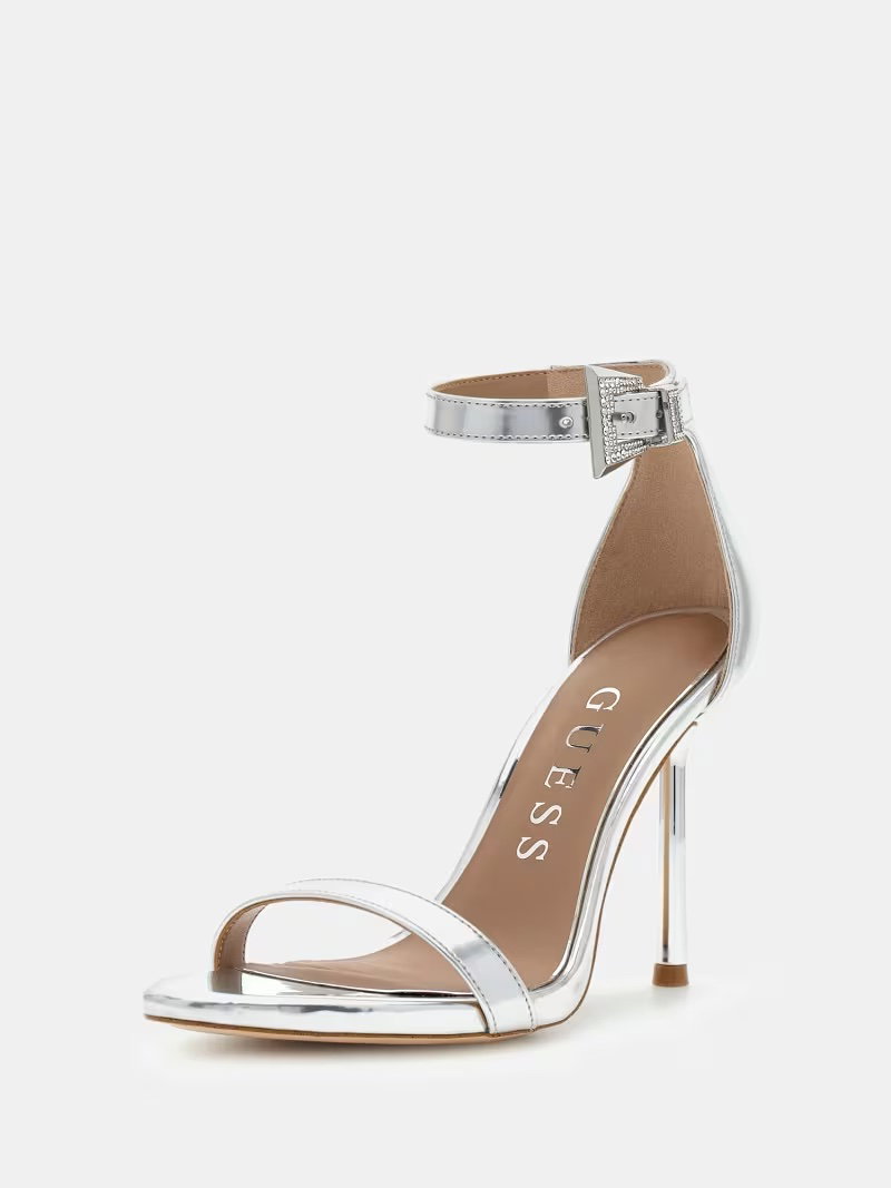 Die perfekten Metallic-High Heels shoppst du für ca. 145 Euro direkt bei Guess .