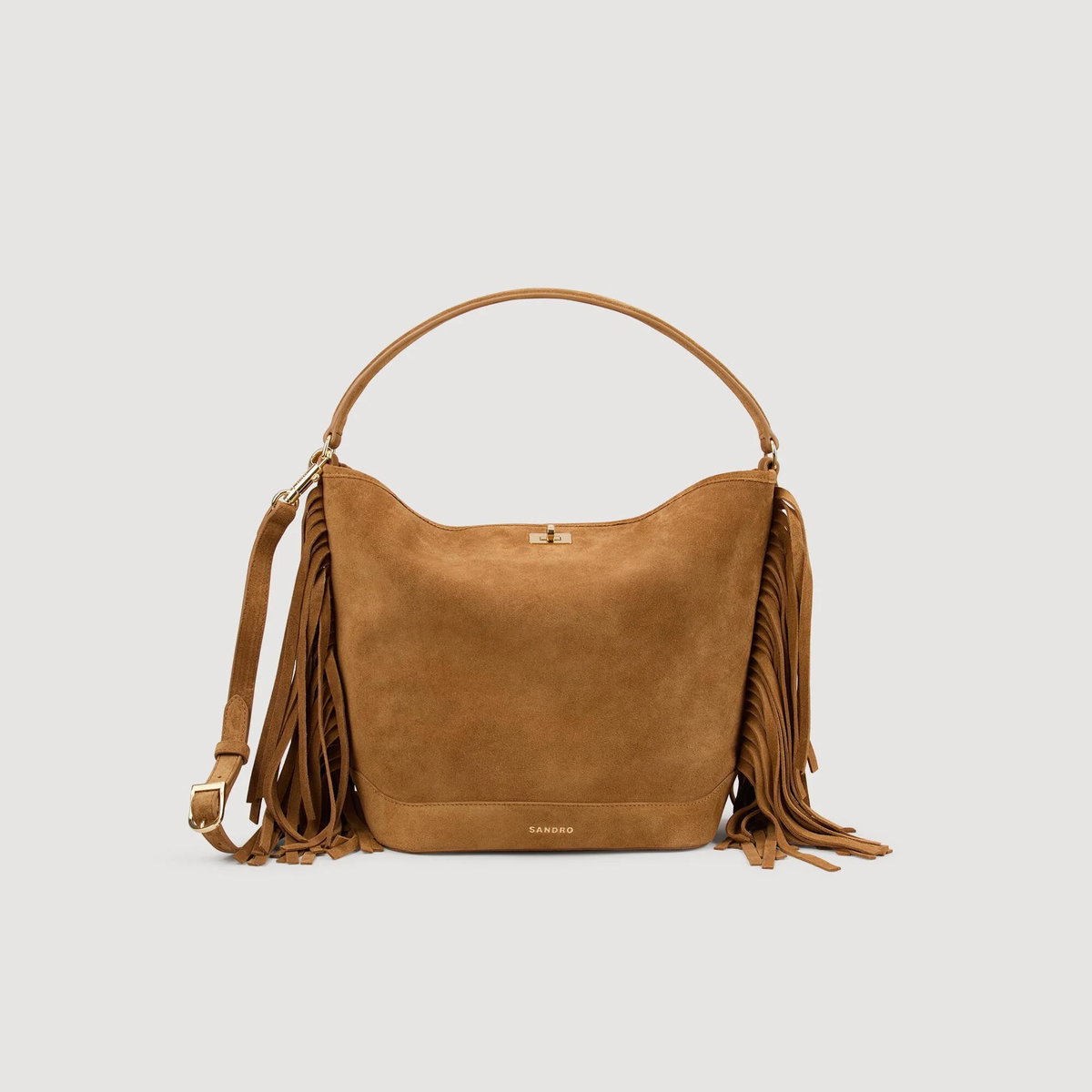 Ein absolutes Must-have unter den It-Bags ist die Tangoso Wildledertasche mit Fransen von Sandro Paris . Diese Tasche kombiniert Bohème-Chic mit luxuriösem Design und ist aus hochwertigem Wildleder gefertigt. Die Fransen verleihen ihr eine verspielte Leichtigkeit, die sowohl im Alltag als auch bei besonderen Anlässen einen modischen Akzent setzt. Mit ihrem großzügigen Innenraum und dem bequemen Schulterriemen ist sie nicht nur ein stilvolles Accessoire, sondern auch ausgesprochen praktisch. Ein Teil, das jedes Outfit sofort aufwertet und deinem Look das gewisse Etwas verleiht. Diese Tasche ist perfekt für alle, die einen Hauch von Retro und gleichzeitig zeitlose Eleganz lieben!