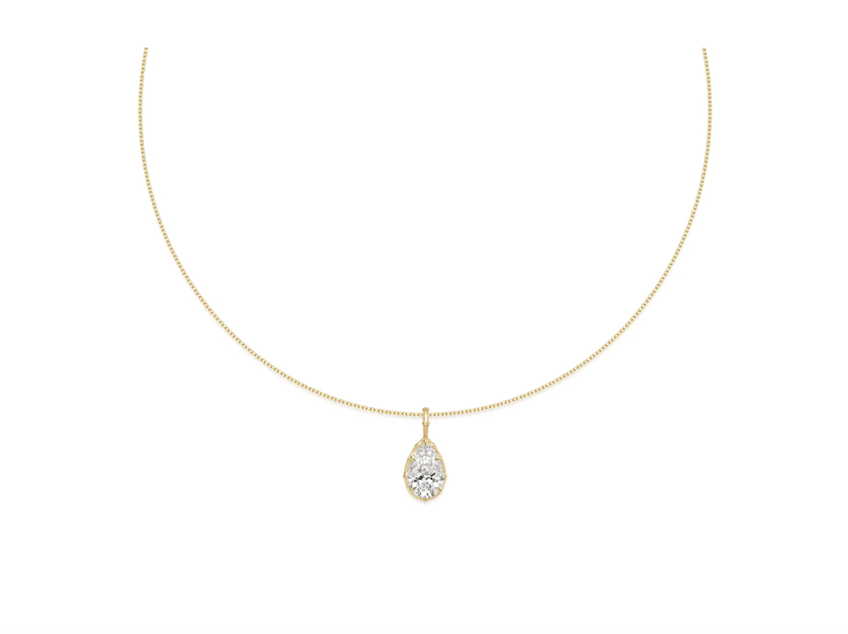 ... diese Halskette aus 18K Gold und einem Diamanten im Pear Schliff.